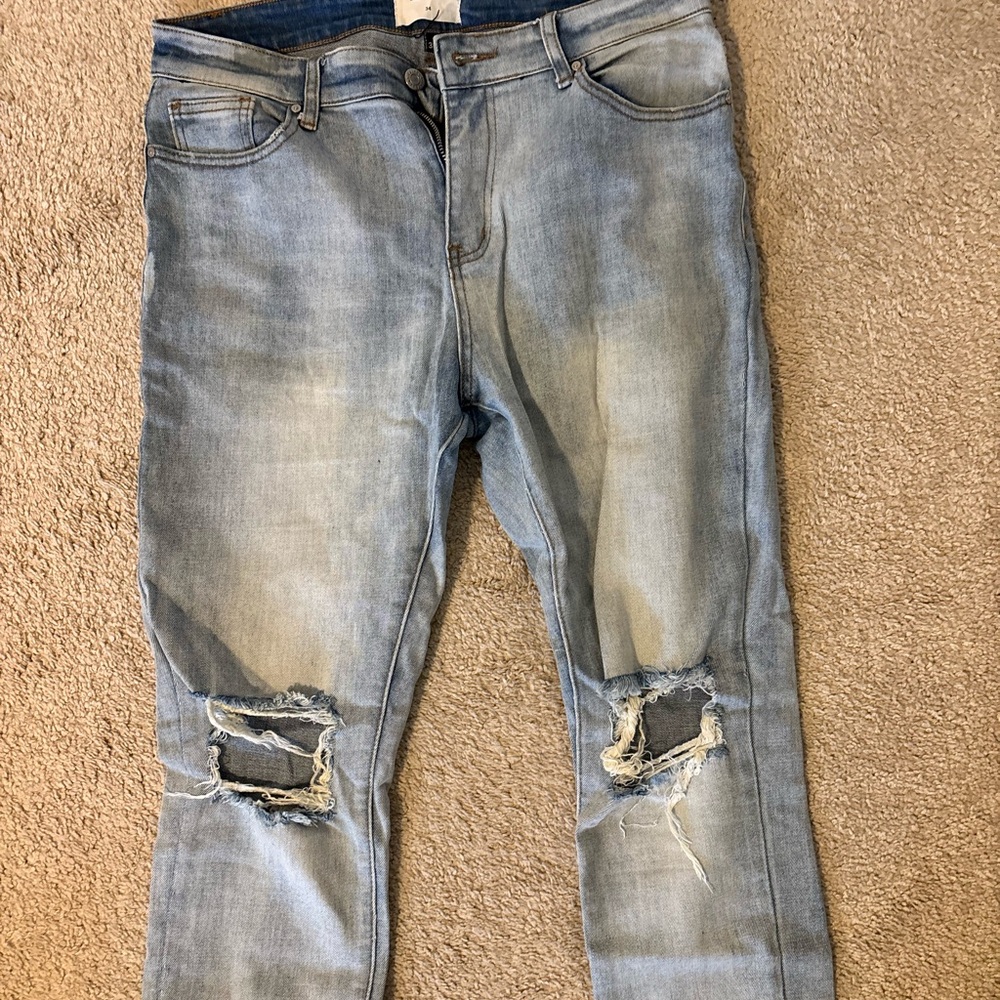 Distressed Light Blue Jeans
